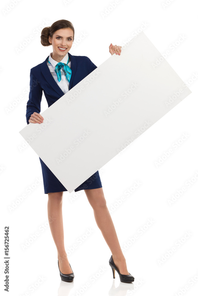 Beautiful Stewardess Is Holding White Poster Beautiful Stewardess Is Holding White Poster