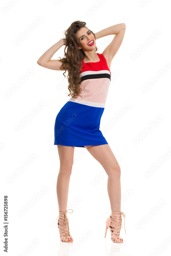 Happy Fashion Model Is Posing With Hands Behind Head Happy Fashion Model Is Posing With Hands Behind Head