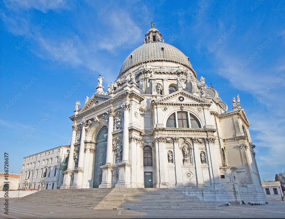 Closeup view: Basilica Santa Maria della Salute on embankment of Canal Grande in Venice, Italy