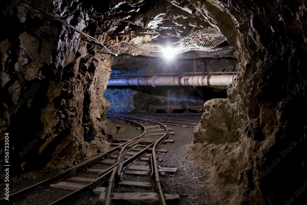 Naklejka premium Old dark dangerous mine corridor
