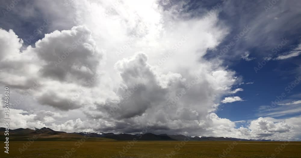 4k time lapse of huge clouds mass rolling over namtso mountains,Danggula(Tanggula) Mountains in xizang Plateau,roof of the World. 4k time lapse of huge clouds mass rolling over namtso mountains,Danggula(Tanggula) Mountains in xizang Plateau,roof of the World.