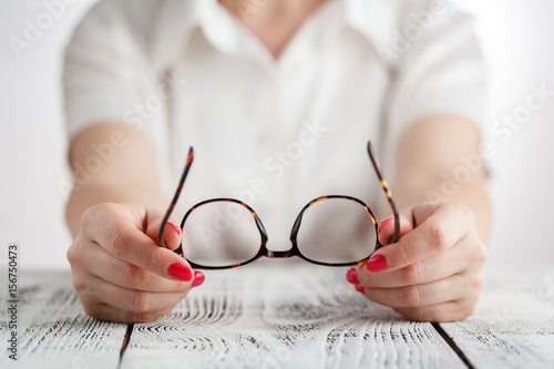Senior business woman portrait with eyeglasses.