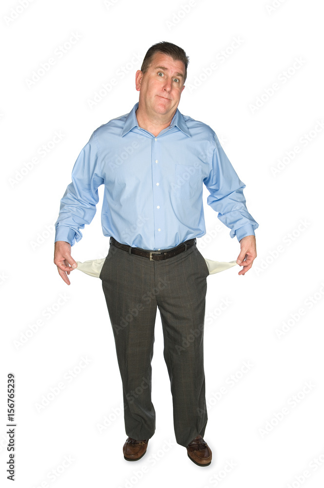 Businessman holding out empty pockets Businessman holding out empty pockets