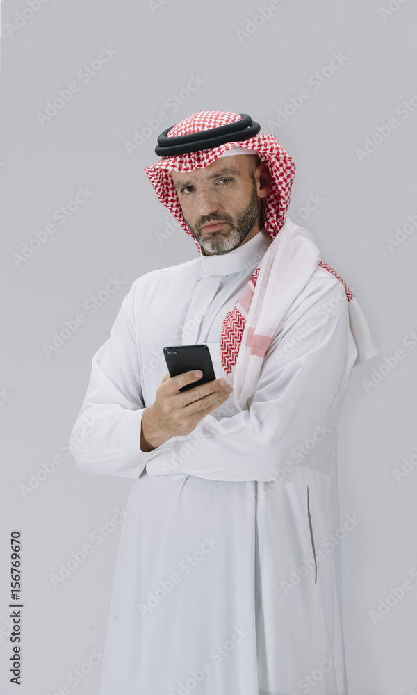 Middle East culture businessman with phone Middle East culture businessman with phone