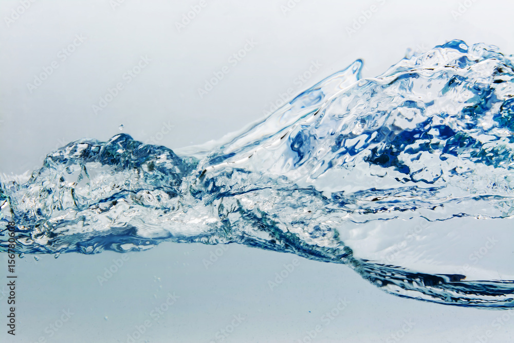 Water splash with bubbles of air, isolated on the white background Water splash with bubbles of air, isolated on the white background