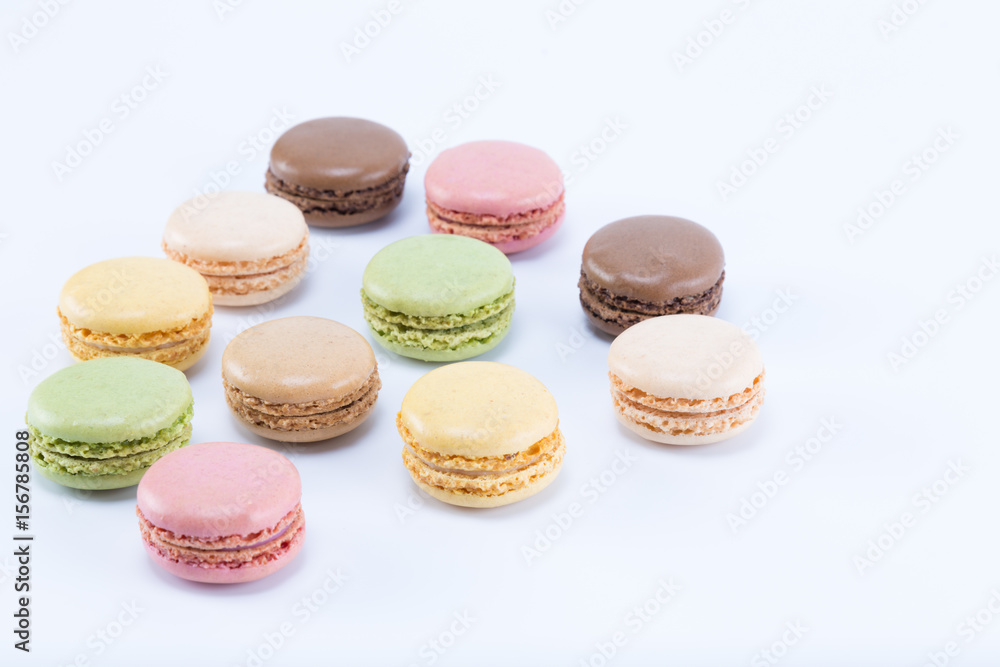 Tasty and colorful macarons isolated on white background Tasty and colorful macarons isolated on white background