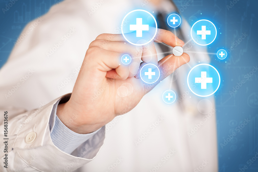 A doctor showing a pill with crosses A doctor showing a pill with crosses