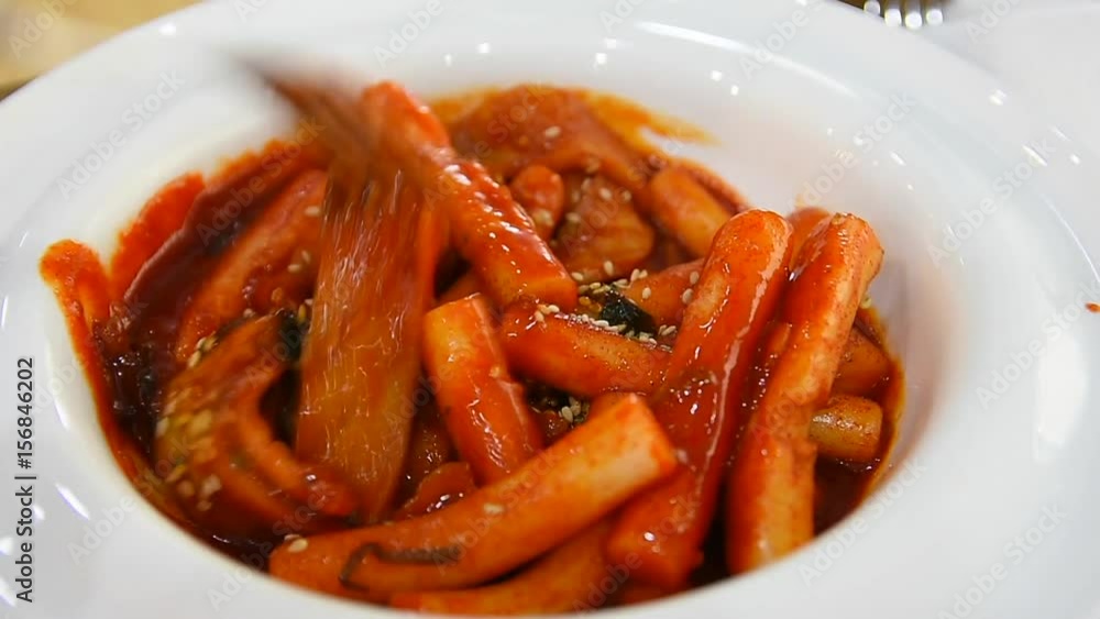 tteokbokki is a famous korean snack that consist of sticky rice, fish cake and gochujang tteokbokki is a famous korean snack that consist of sticky rice, fish cake and gochujang