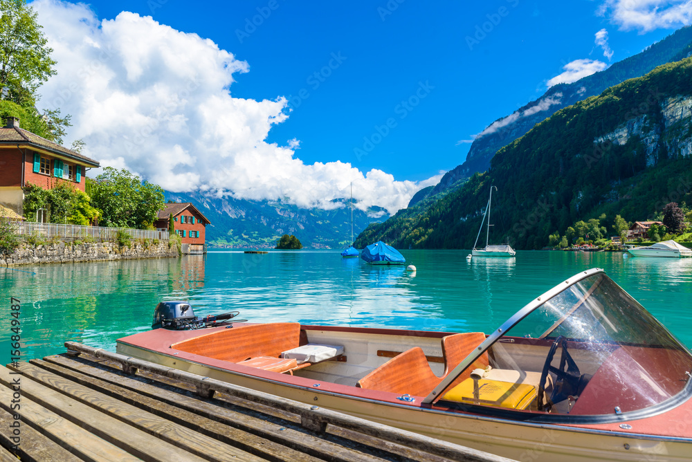 Bay of  Lake Brienz at Village Iseltwald - beautiful lake in the alps at Interlaken, Switzerland