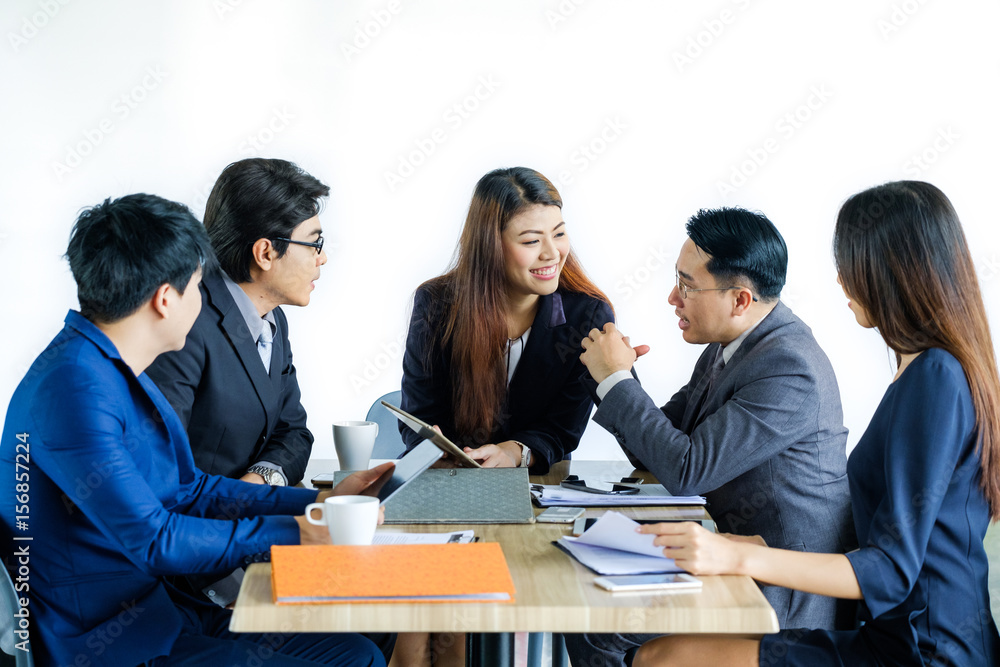 Portrait Of Multiracial Businesspeople Brainstorming In Meeting Portrait Of Multiracial Businesspeople Brainstorming In Meeting