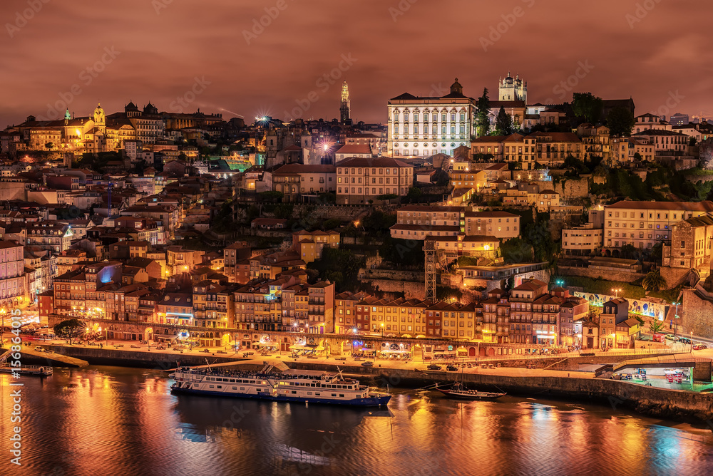 Porto, Portugal: and the old town and Douro river at night
