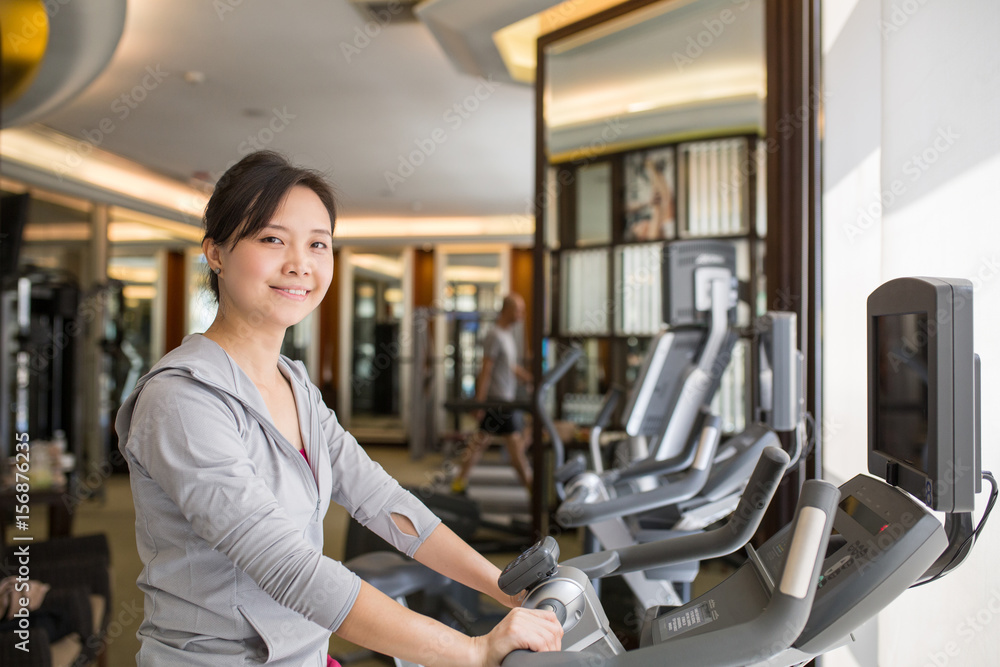 Asian woman ride bicycle i Asian woman ride bicycle i