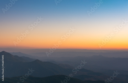 Twilight sunset time: mountain layer background at Chiangmai province, Thailand © Putty