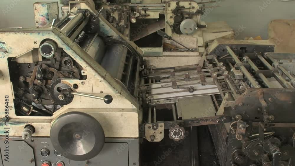 A background of a detailed view of gears from a machine, Printing machinery A background of a detailed view of gears from a machine, Printing machinery