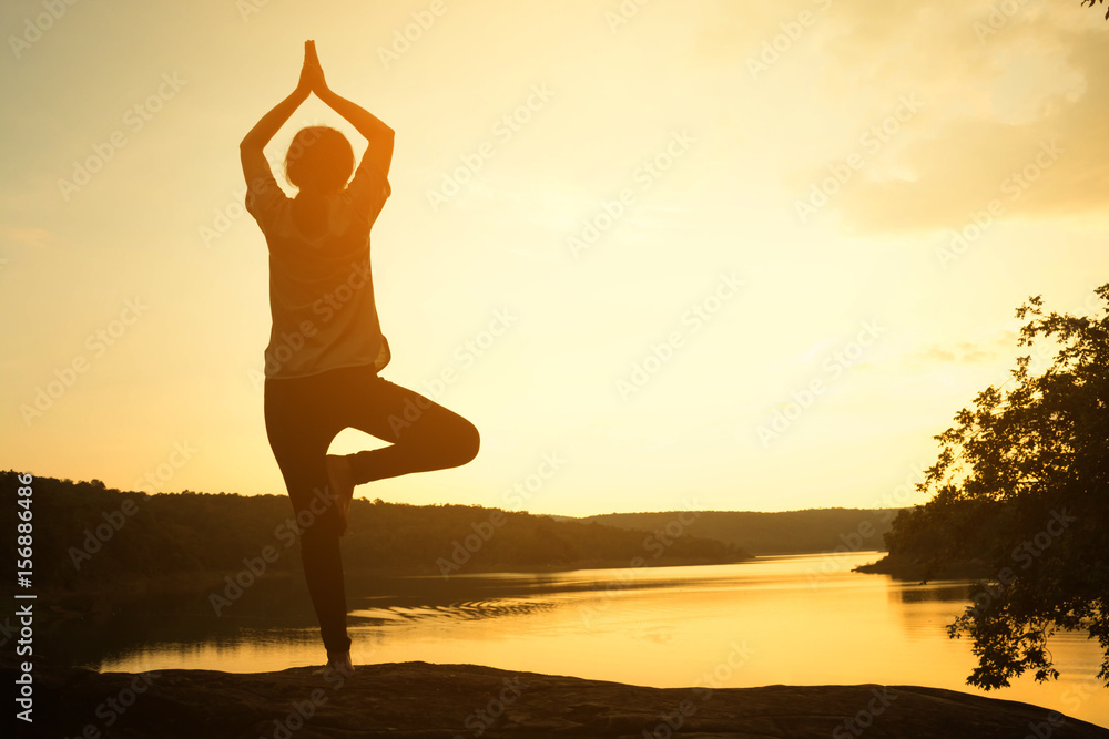 Silhouette young women yoga on nature, Concept yoga. Silhouette young women yoga on nature, Concept yoga.