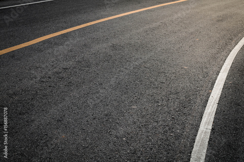 Asphalt road close-up background.