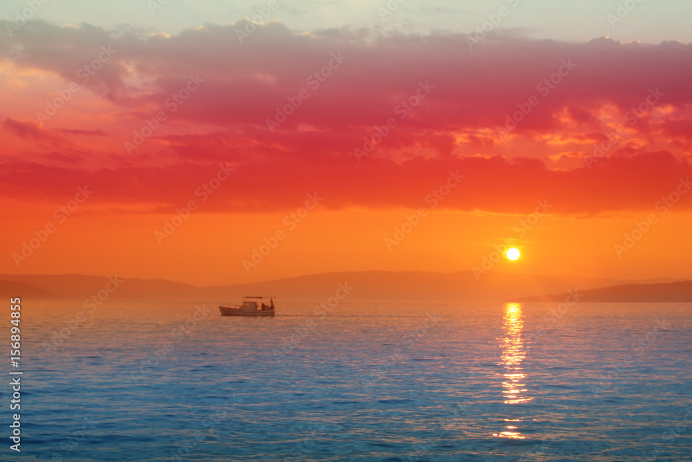 Silhouette of motor boats in the sea In  saturated colors. Seascape. Minimalism