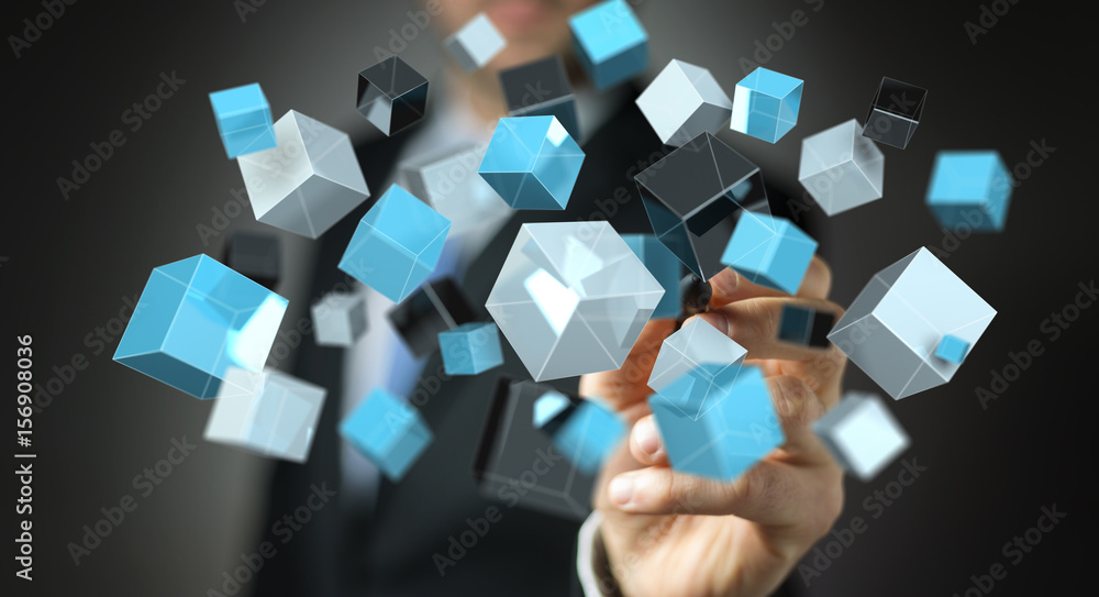 Businessman holding floating blue shiny cube network 3D rendering Businessman holding floating blue shiny cube network 3D rendering