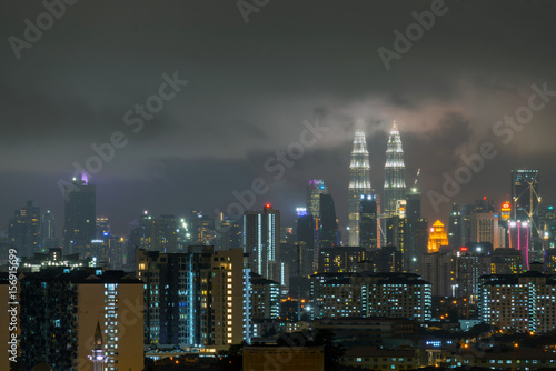 Night view of downtown Kuala Lumpur. Its modern skyline is dominated by the 451m-tall KLCC, a pair of glass-and-steel-clad skyscrapers.