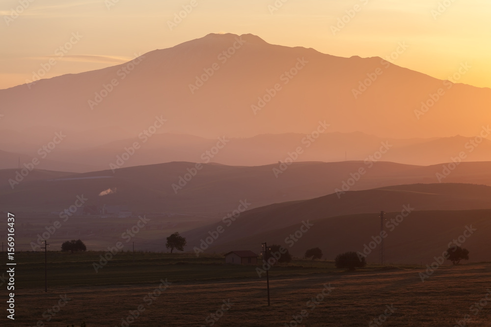 Sunrise over mount Etna - tallest active volcano in Europe. Sicily, Italy Sunrise over mount Etna - tallest active volcano in Europe. Sicily, Italy