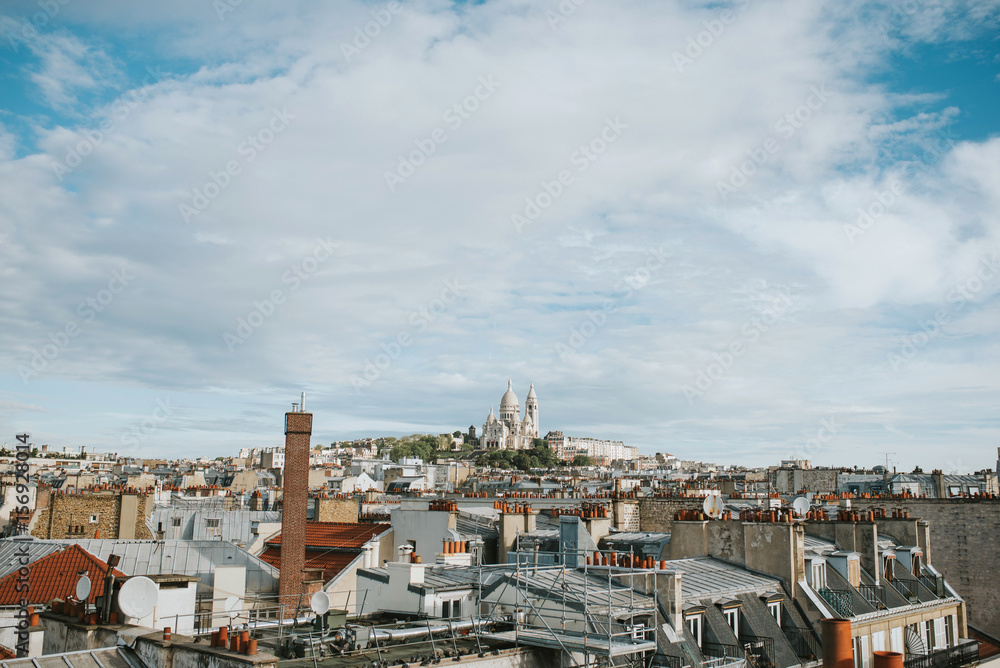 Roofs of Paris with Montmartre