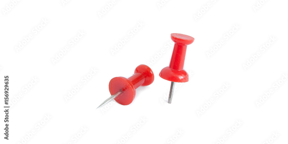 two isolated red push pins in white background two isolated red push pins in white background
