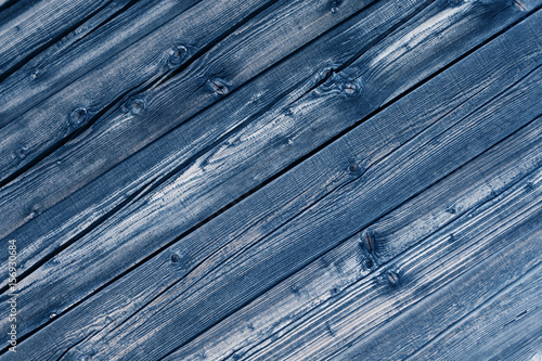 Natural bluecolored pine wood panels as background photo