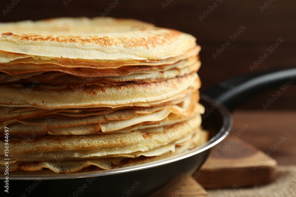 Tasty pancakes on pan, closeup Tasty pancakes on pan, closeup