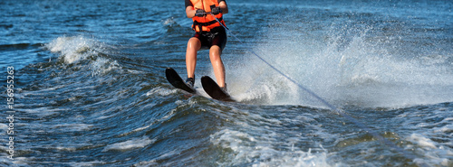 Valokuva Woman riding water skis closeup
