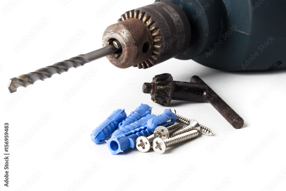Driller dowel and screw isolated on white background Driller dowel and screw isolated on white background