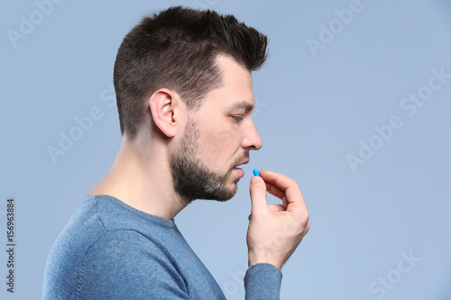 Handsome young man taking p...
