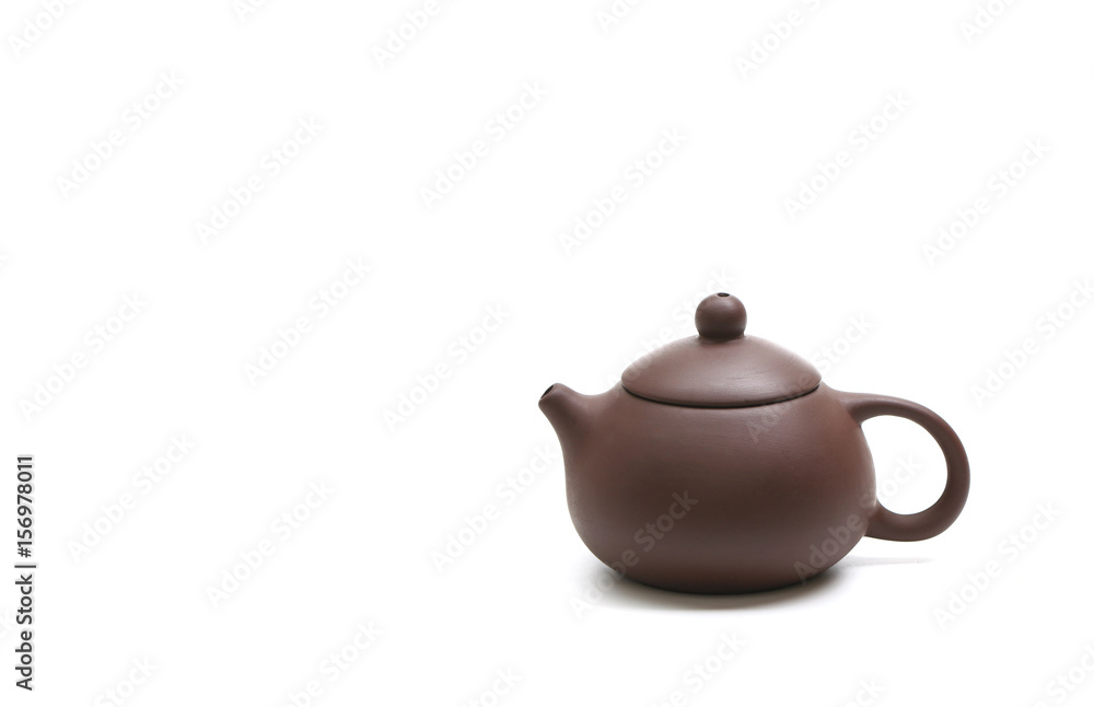 purple clay teapot isolated on white background purple clay teapot isolated on white background