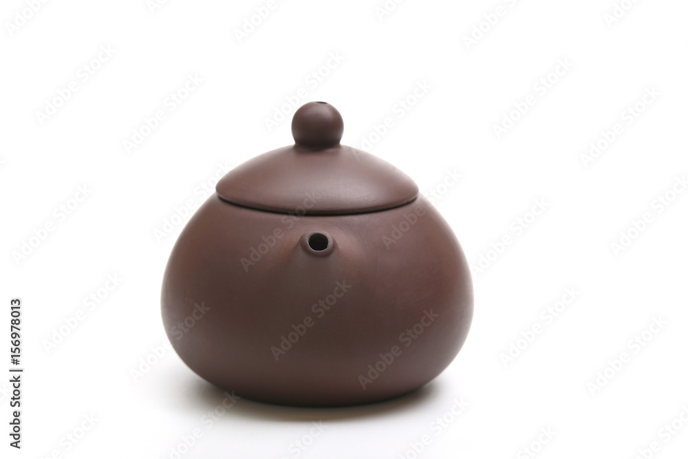 purple clay teapot isolated on white background purple clay teapot isolated on white background