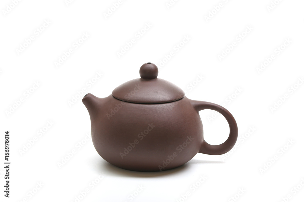 purple clay teapot isolated on white background purple clay teapot isolated on white background