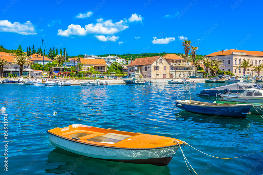 Obraz premium Fishing place island Hvar. / Waterfront view at ancient fishing place on Island Hvar, Starigrad town, Croatia summertime resorts.