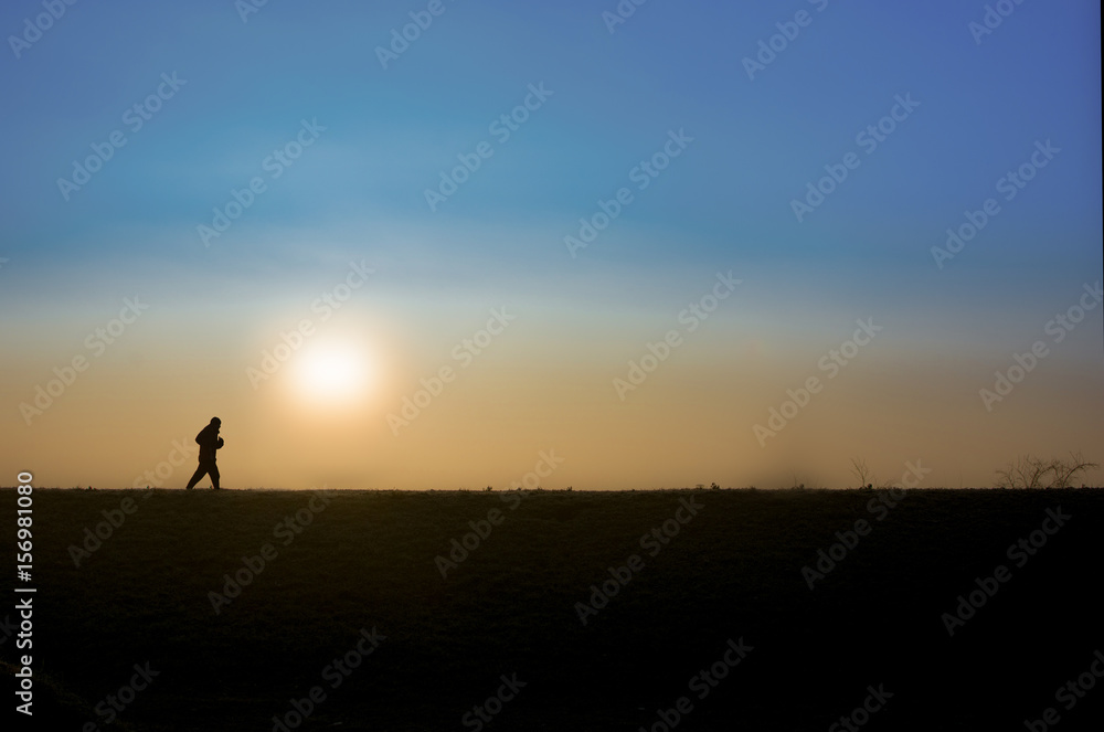 Early morning lonely jogger