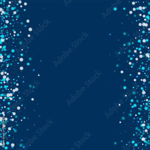Beautiful falling snow. Messy border with beautiful falling snow on deep blue background. Vector illustration.
