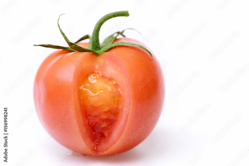 Fresh red tomato isolated on white Fresh red tomato isolated on white
