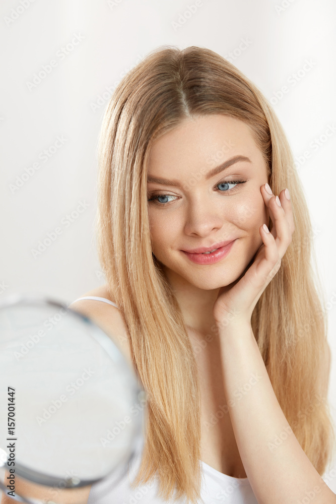 Facial Beauty. Sexy Woman With Healthy Skin Looking In Mirror Facial Beauty. Sexy Woman With Healthy Skin Looking In Mirror