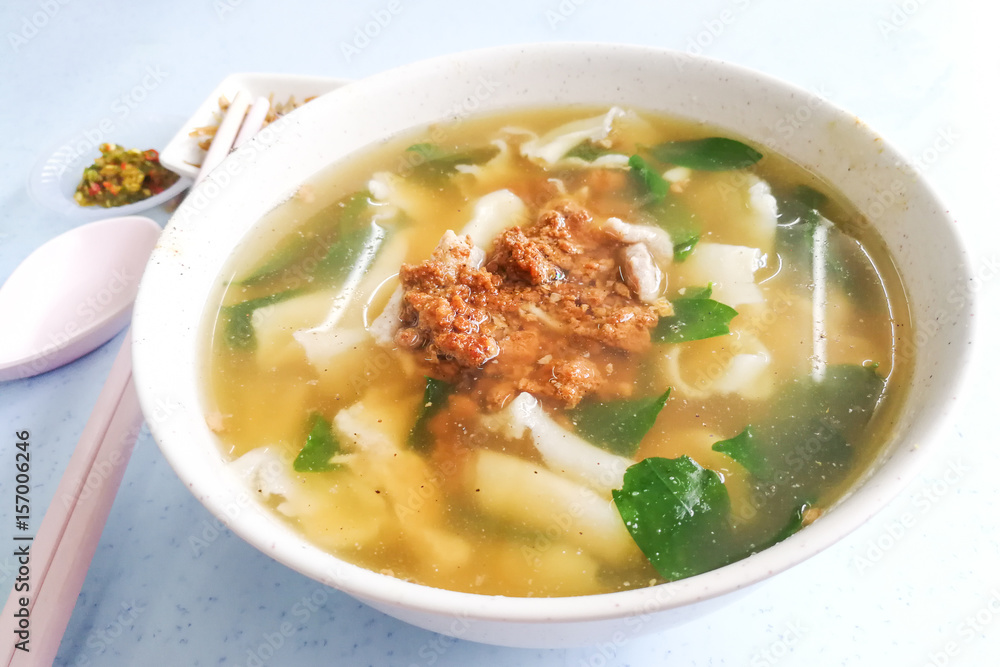 Flat flour noodle soup or Pan Mee, popular Malaysia cuisine Flat flour noodle soup or Pan Mee, popular Malaysia cuisine
