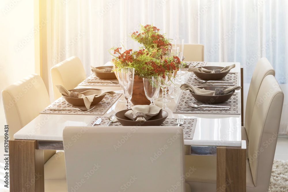 dining table in modern home with elegant table setting for breakfast dining table in modern home with elegant table setting for breakfast