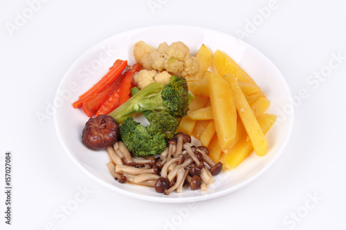 Fried potato and Shimeji mushroom with mixed vegetables.