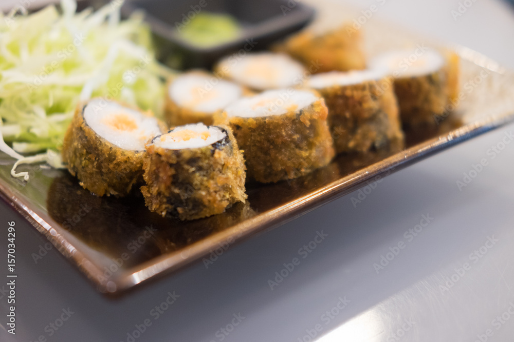 Sushi Roll with salmon in a beautiful plate Sushi Roll with salmon in a beautiful plate