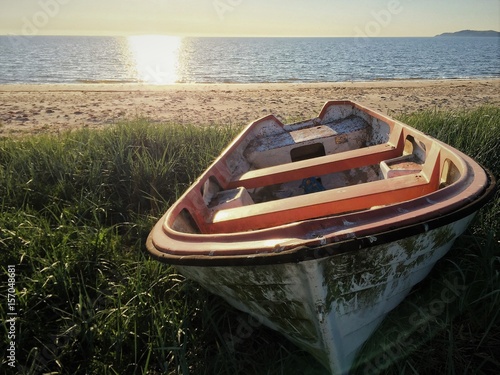 rowing boat by beach in sunset 2