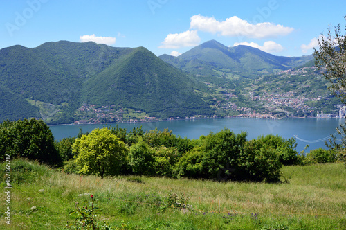 Lake panorama from "Monte Isola". Italian landscape. Island on lake. View from the island Monte Isola on Lake Iseo, Italy 