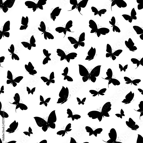 Black silhouettes of butterflies on a white background seamless pattern. Vector illustration