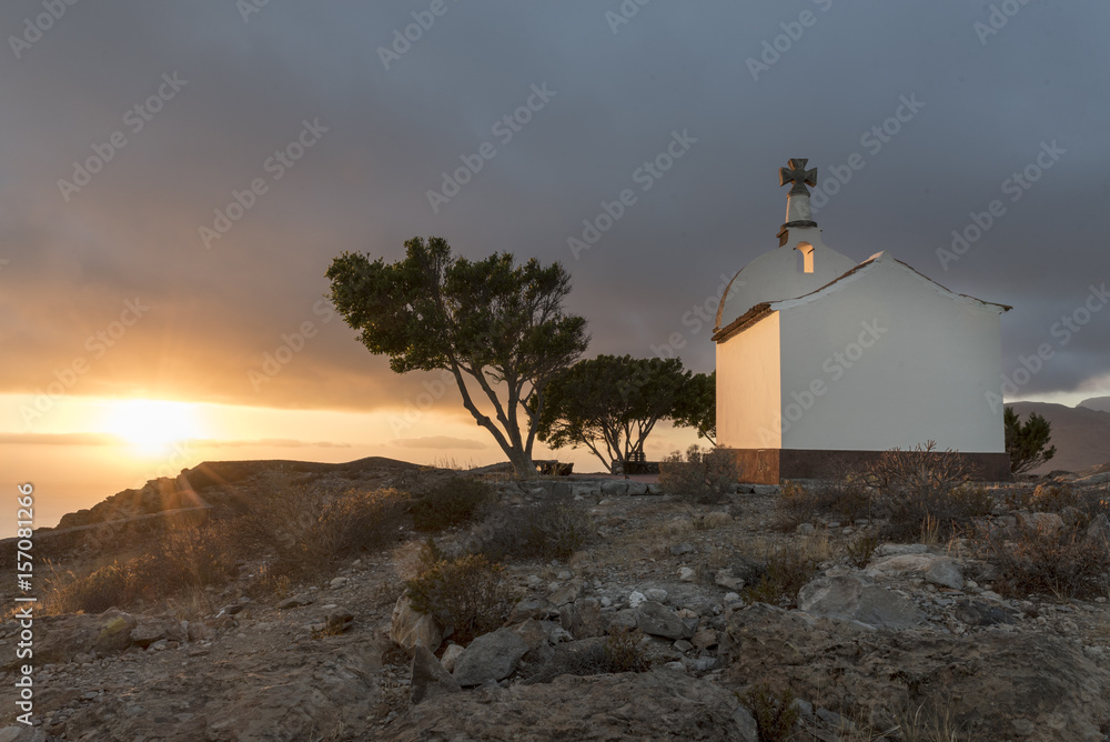 Chapel on a hill at sunrise
