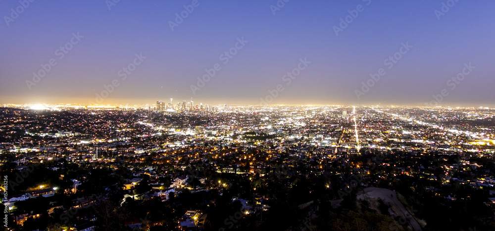 The huge city of Los Angeles at night - aerial view - LOS ANGELES - CALIFORNIA - APRIL 19, 2017 The huge city of Los Angeles at night - aerial view - LOS ANGELES - CALIFORNIA - APRIL 19, 2017