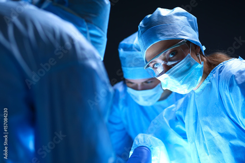 Team surgeon at work on operating in hospital