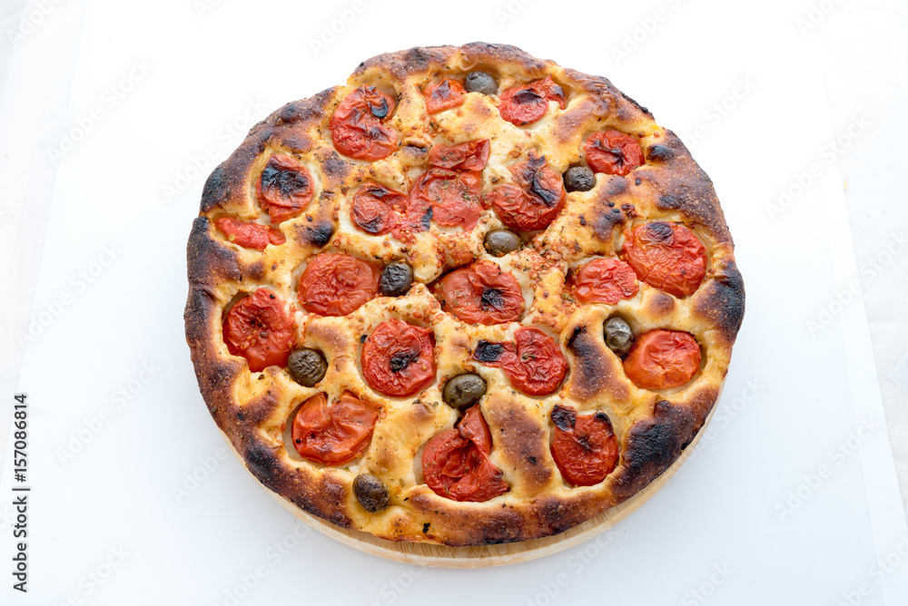 Focaccia typical of Bari Italy with tomatoes and olive Focaccia typical of Bari Italy with tomatoes and olive